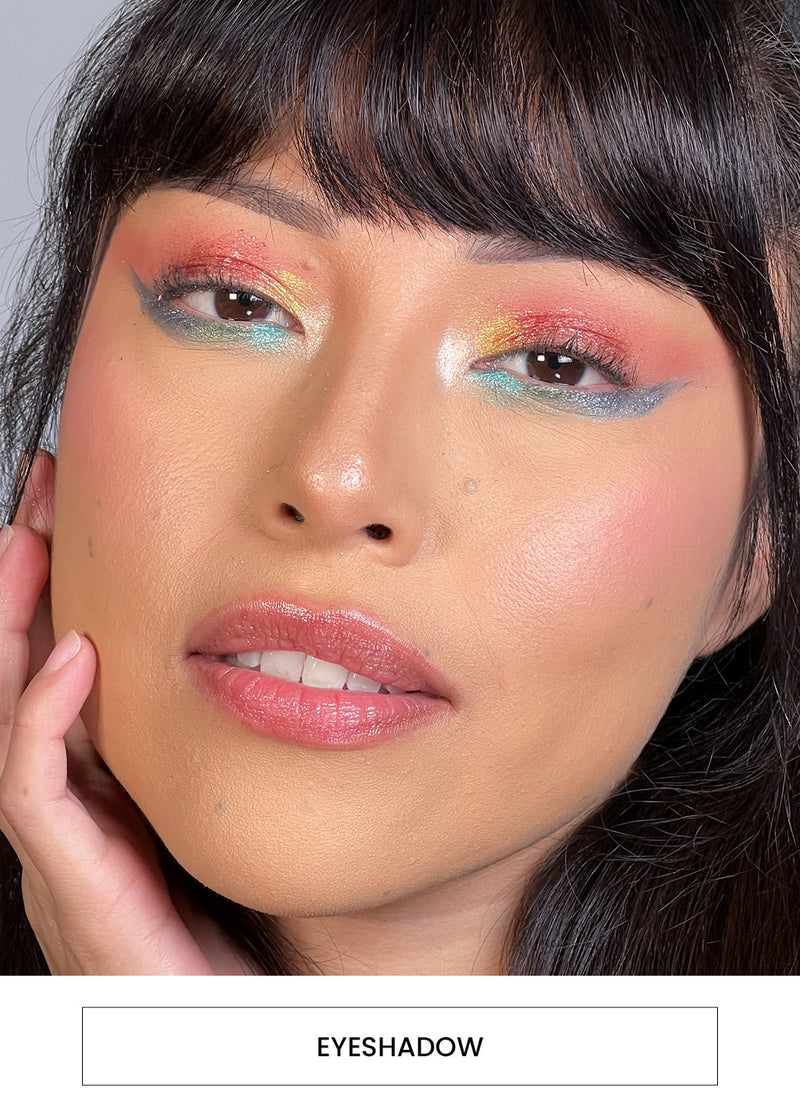 Image of a woman wearing a colorful eyeshadow look alongside a  “Eyeshadow” button
