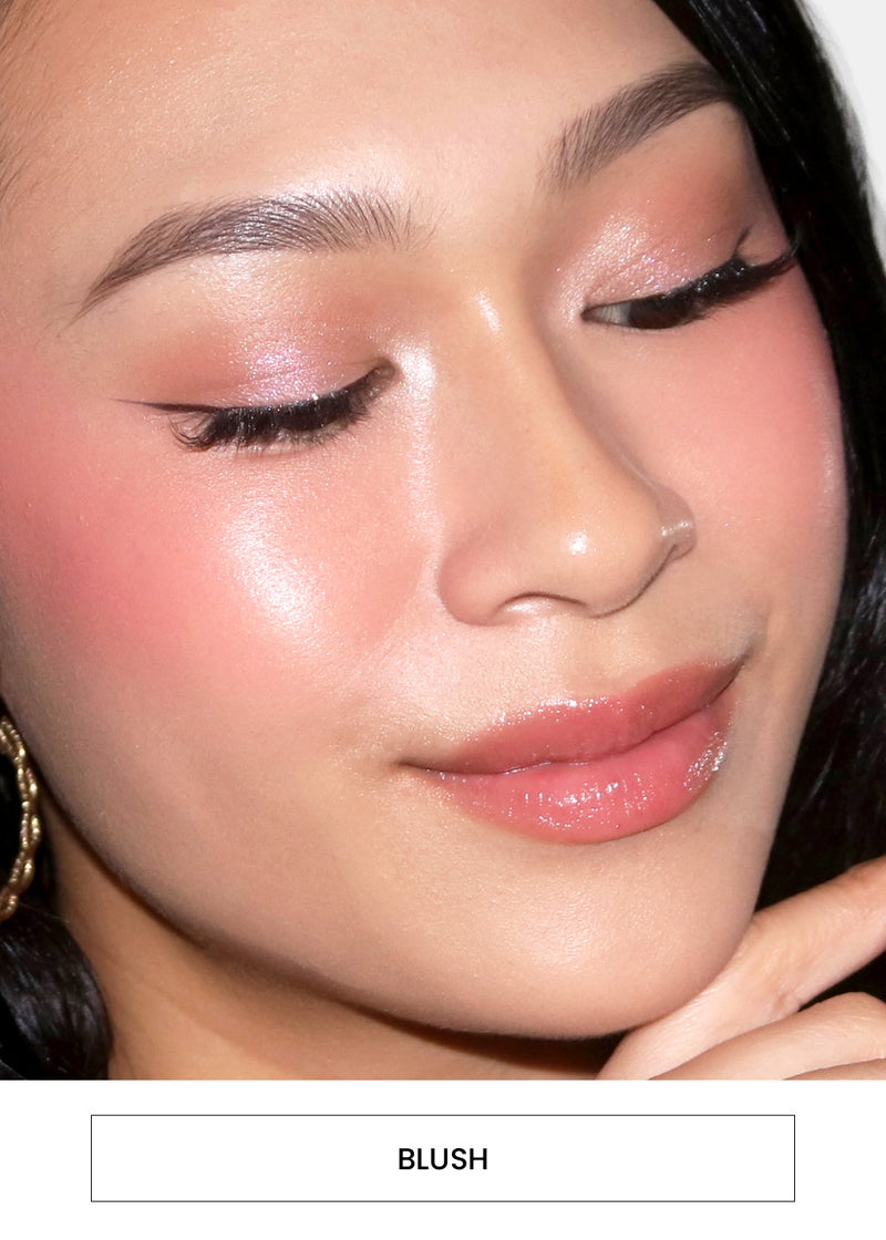 Image of a woman wearing blush. Followed by a "Blush" button.