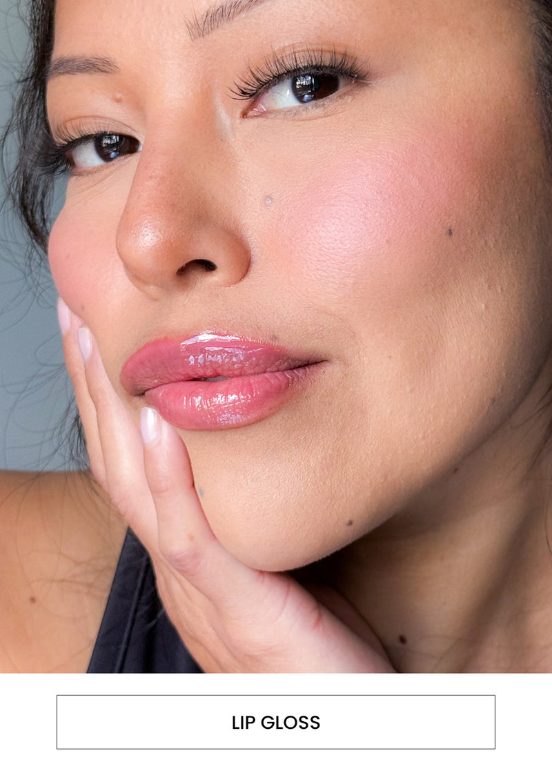 Image of a woman wearing pink lip gloss alongside a  “Lip Gloss” button