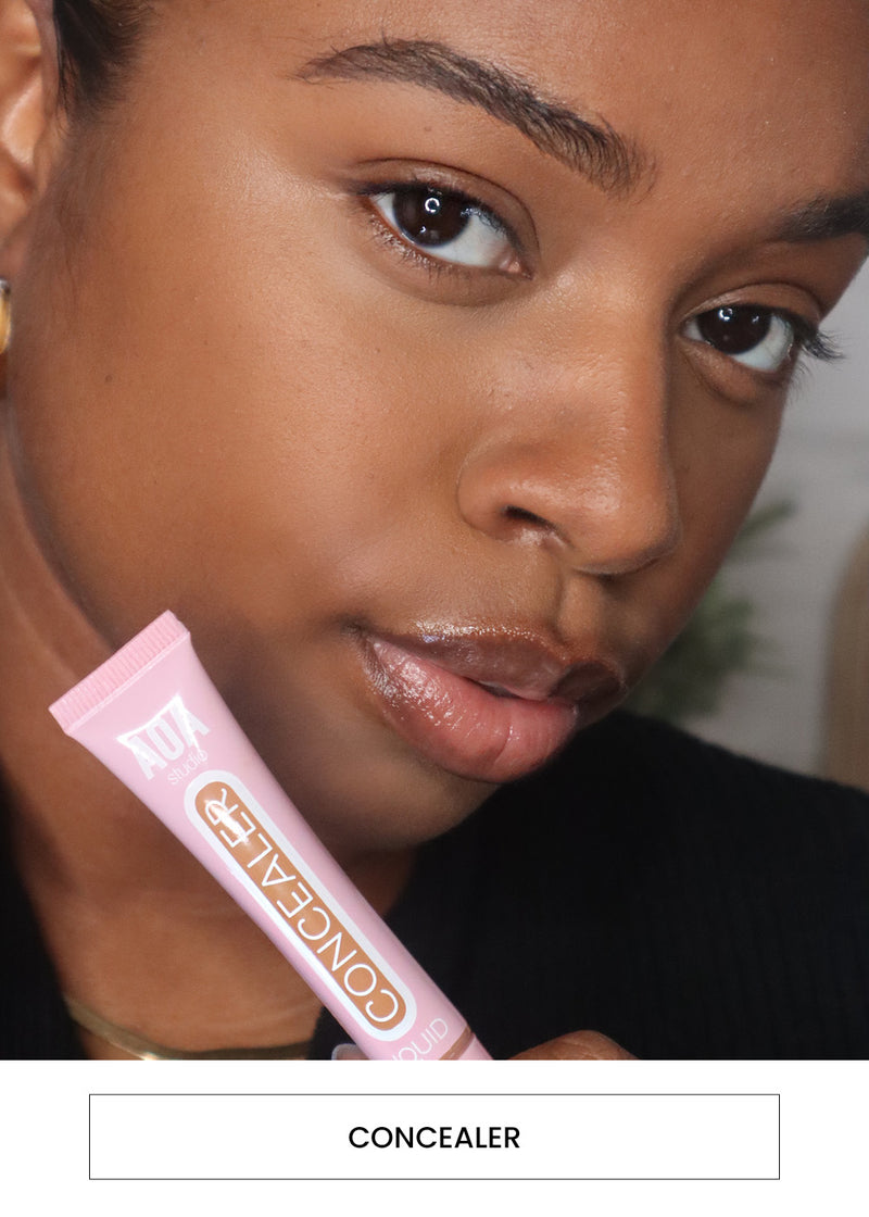 Image of a woman wearing the Paw Paw Concealer on her face alongside a “Concealer” button