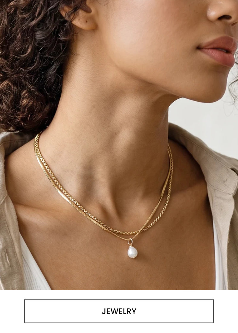 Image of a woman wearing 2 golden necklaces alongside a  “Jewelry” button
