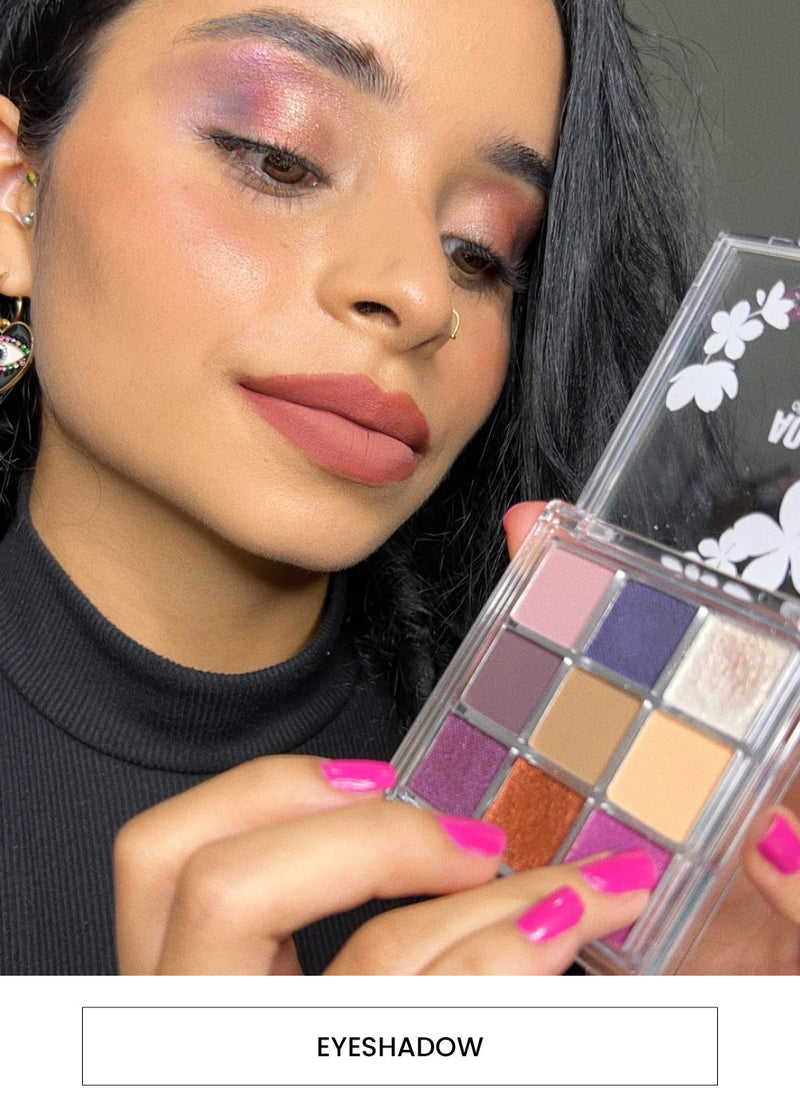Image of a woman wearing a autumn eyeshadow look alongside a “Eyeshadow” button